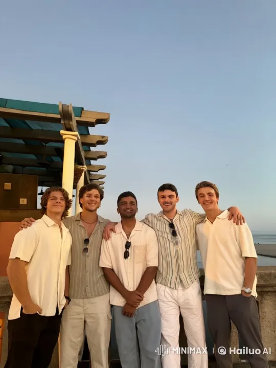Five Men Share Intimate Moments by the Ocean at Sunset – AI Generated Video | Hailuo AI