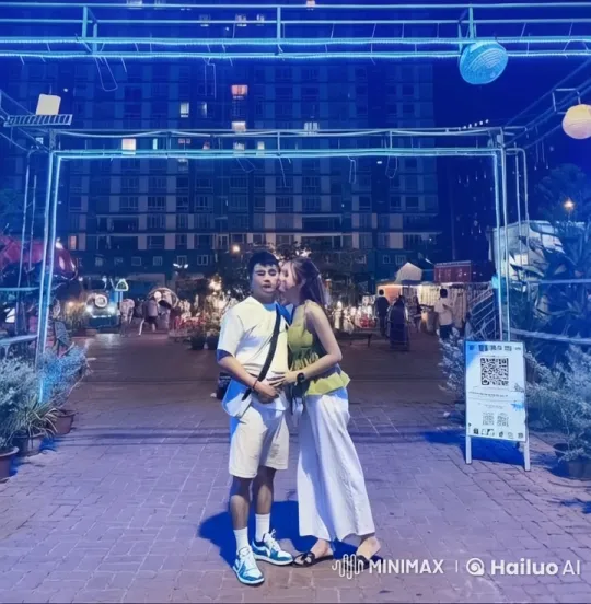 Couple Practicing Kung Fu in Night Market with Dramatic Lighting – AI Generated Video | Hailuo AI