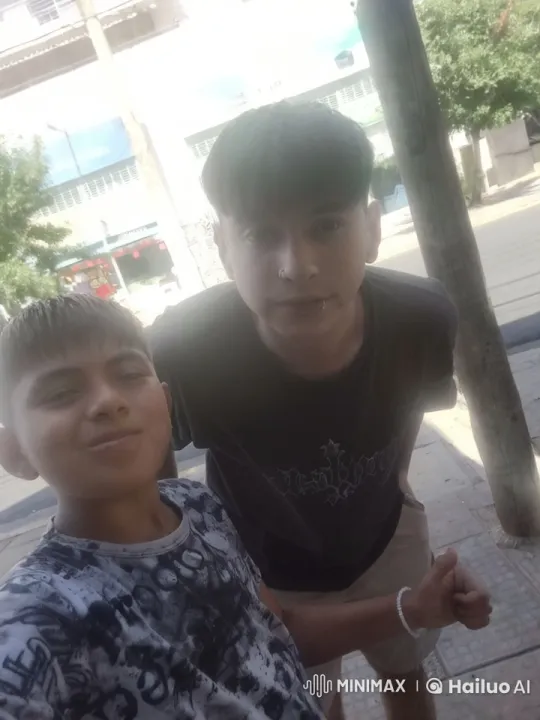 Two Individuals Engaging in Minor Street Confrontation – AI Generated Video | Hailuo AI