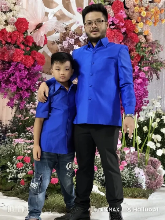 Father and Child Enjoy Friendly Kung Fu Sparring in Floral Setting – AI Generated Video | Hailuo AI