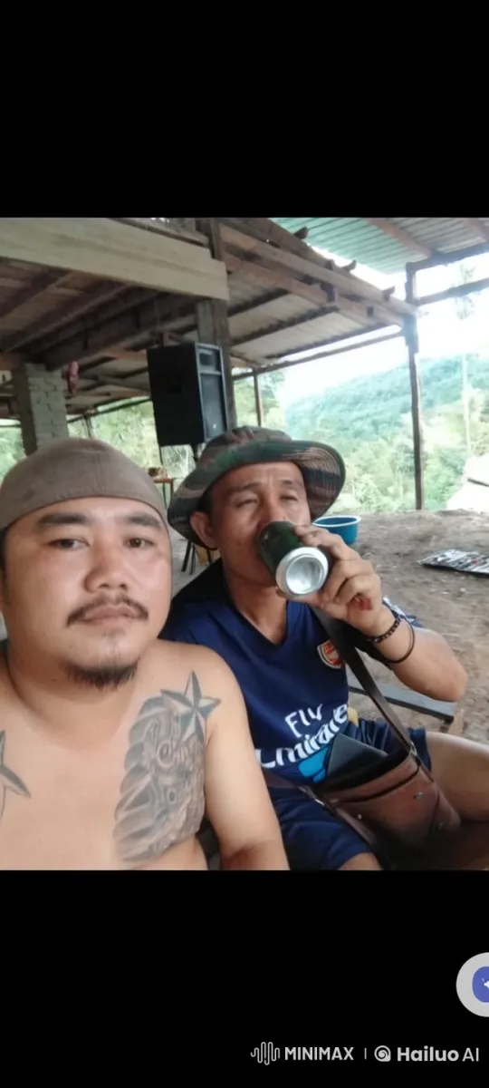 Rustic Friendship: Men's Playful Scuffle in Nature – AI Generated Video | Hailuo AI