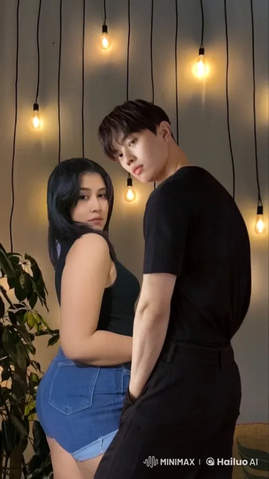 Couple Shares Tender Moment in Cozy, Lit Room – AI Generated Video | Hailuo AI