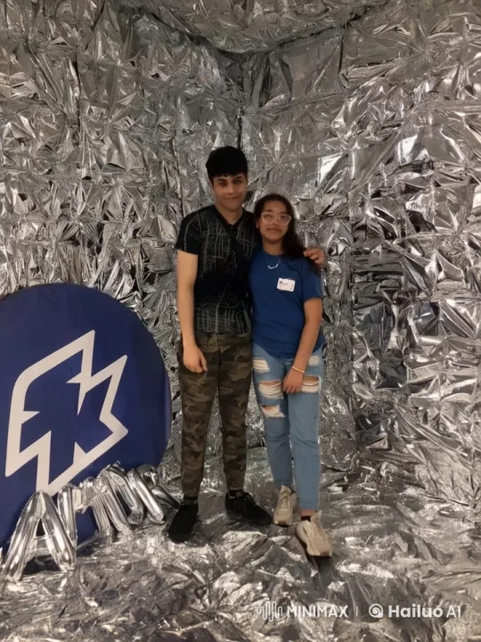 Couple's Romantic Moments Against Metallic Backdrop – AI Generated Video | Hailuo AI
