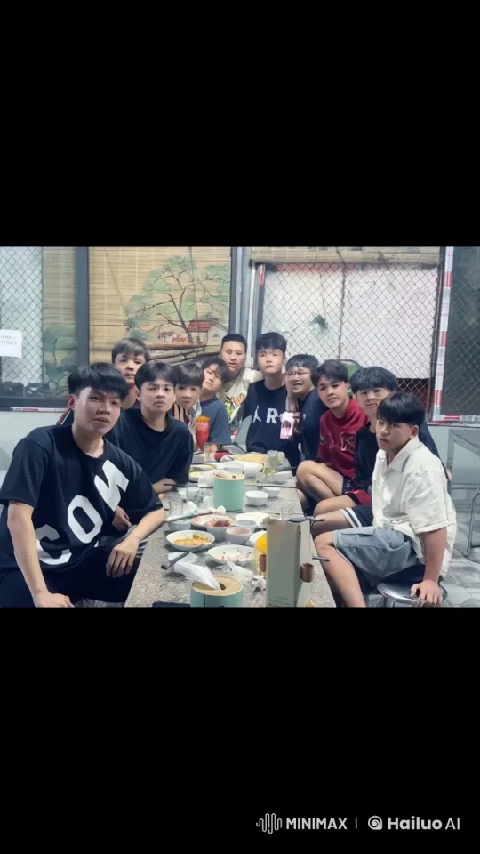 Young Men Engage in Playful Martial Arts Fight at Social Gathering – AI Generated Video | Hailuo AI