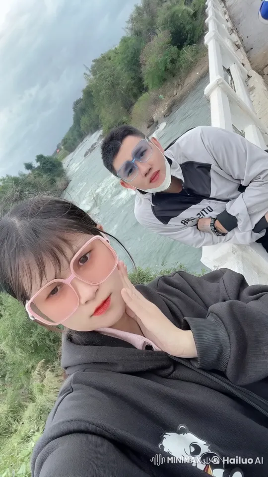 Kungfu Practitioners Display Skill on Scenic Bridge – AI Generated Video | Hailuo AI
