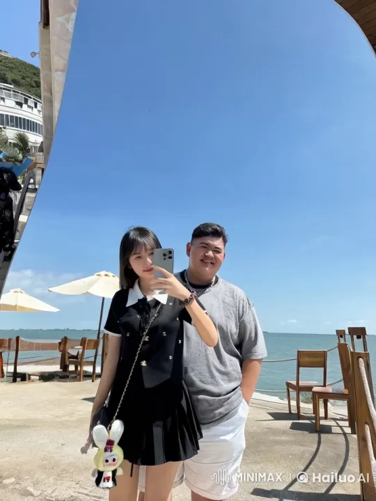 Young Couple Showcases Impressive Kung Fu Skills on Waterfront – AI Generated Video | Hailuo AI