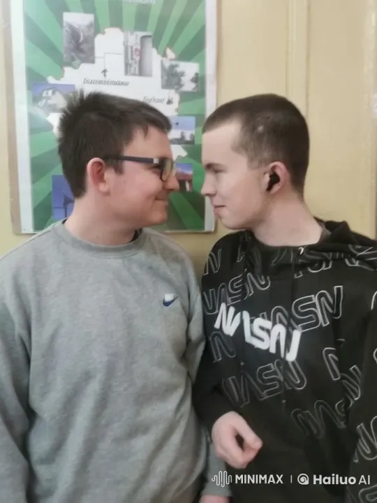 Two Individuals Share a Gentle Kiss in Casual Clothing – AI Generated Video | Hailuo AI