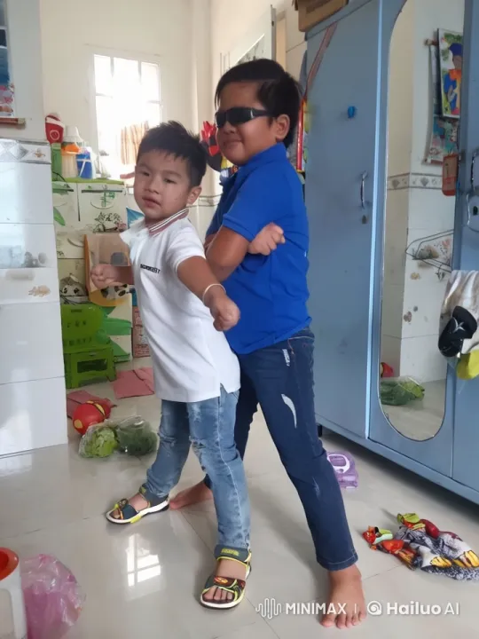 Boys Engage in Energetic Kung Fu Mock Fight – AI Generated Video | Hailuo AI
