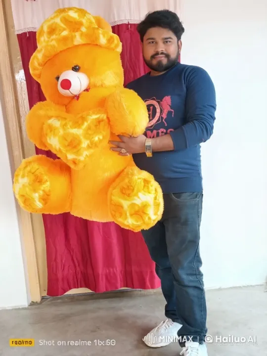 Man Affectionately Embraces and Kisses Yellow Teddy Bear – AI Generated Video | Hailuo AI