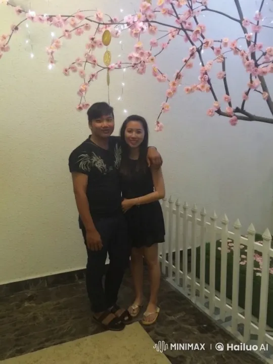 Couple Prepares for Kung Fu Stance in Cherry Blossom Setting – AI Generated Video | Hailuo AI