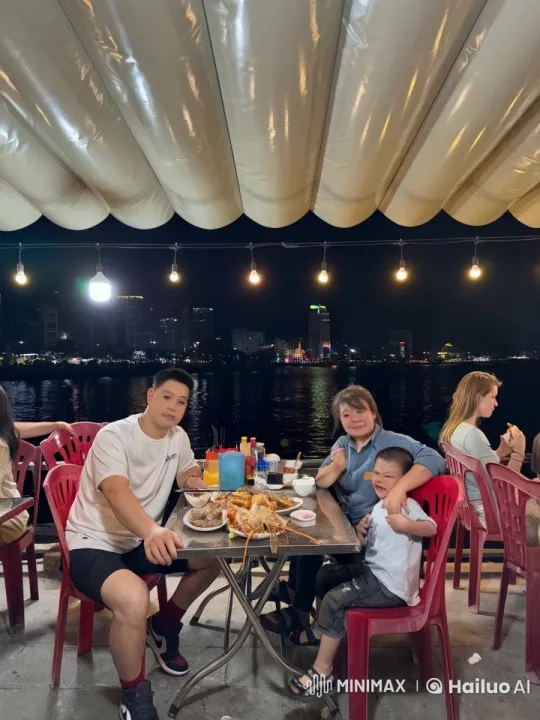 Family Enjoying Dinner Engages in Playful Kungfu by Waterfront – AI Generated Video | Hailuo AI