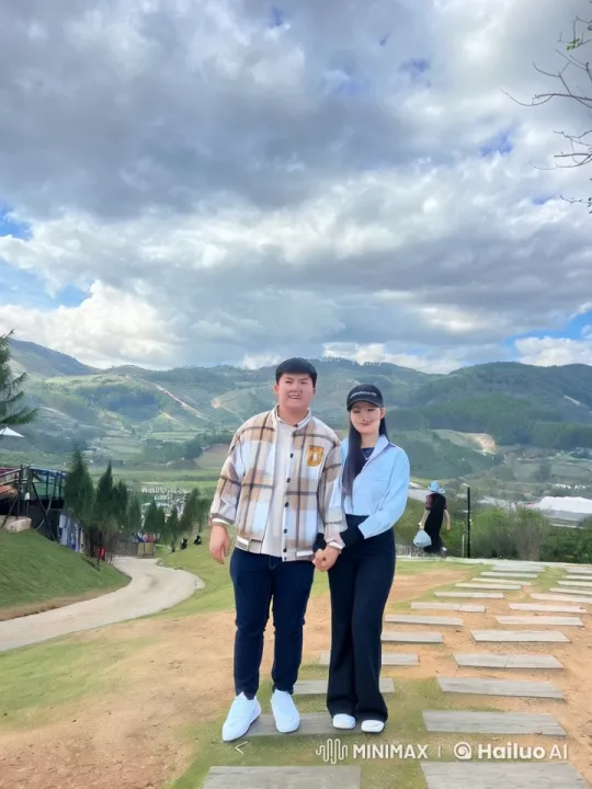 Martial Arts Couple Showcases Skills in Mountain Scenery – AI Generated Video | Hailuo AI