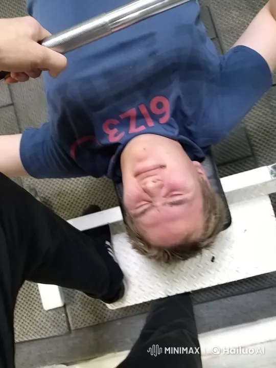 Bench Press Exercise with Spotter in Gym – AI Generated Video | Hailuo AI