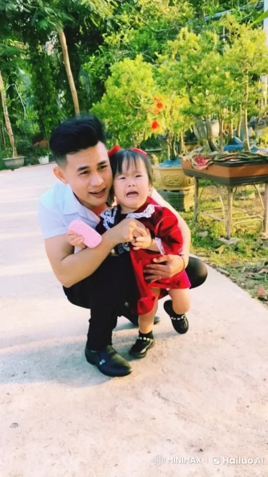 Father and Daughter Joyfully Practice Martial Arts in Garden – AI Generated Video | Hailuo AI