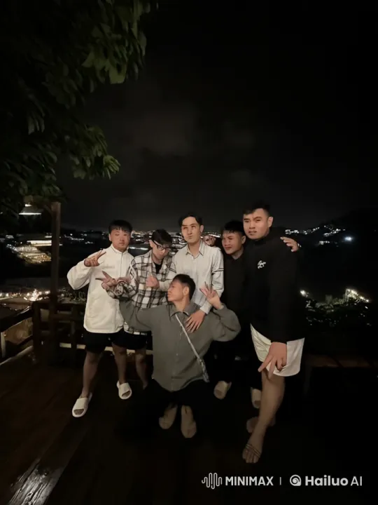 Friends Enjoy Playful Kung Fu on Deck at Night – AI Generated Video | Hailuo AI