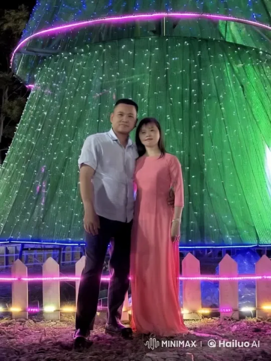 Couple Sways in Front of Illuminated Christmas Tree – AI Generated Video | Hailuo AI