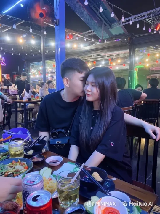 Romantic Couple Enjoying Dinner in Vibrant Restaurant – AI Generated Video | Hailuo AI