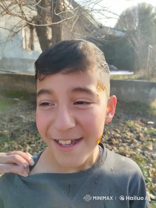 Boy Kissed on Cheek by Man in Winter Scene – AI Generated Video | Hailuo AI