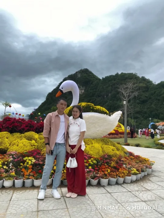 Couple Performs Impressive Kungfu in Flower Garden Setting – AI Generated Video | Hailuo AI
