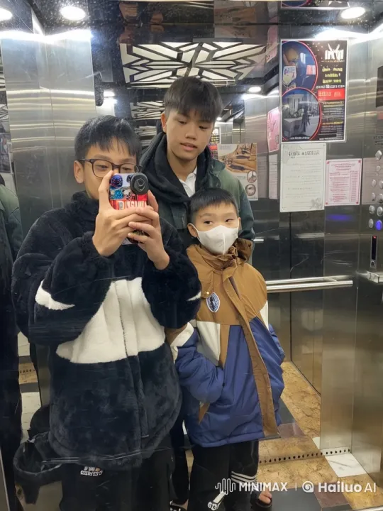 Boys Taking Selfie in Reflective Elevator – AI Generated Video | Hailuo AI