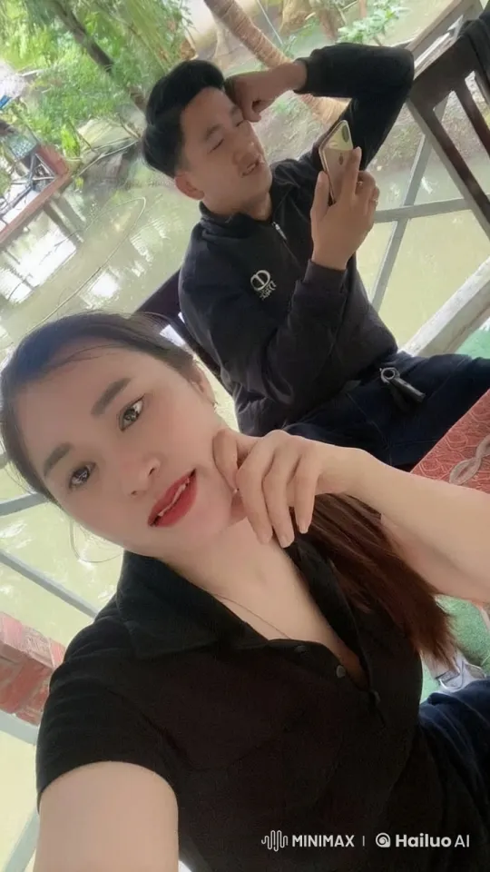 Person Frustrated with Phone in Serene Setting – AI Generated Video | Hailuo AI