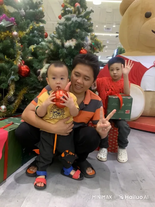 Children Play Fight in Front of Christmas Trees – AI Generated Video | Hailuo AI