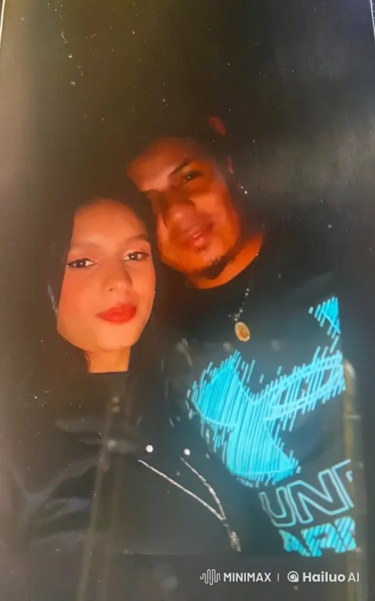 Intimate Moment: Loving Embrace in Dim Light – AI Generated Video | Hailuo AI