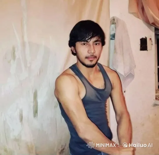 Man Flexes in Minimalist Setting with Camera Pan and Zoom – AI Generated Video | Hailuo AI