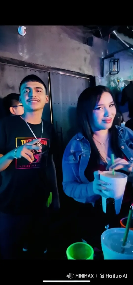 Young Couple's Romantic Moments at a Lively Party – AI Generated Video | Hailuo AI