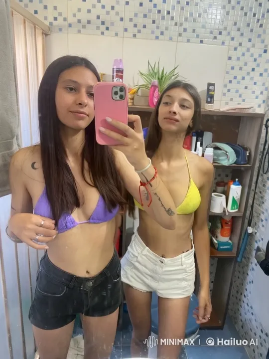Two Friends Taking a Selfie in a Bathroom – AI Generated Video | Hailuo AI