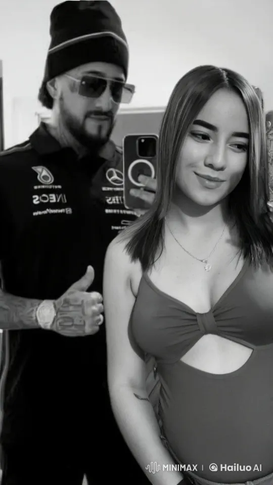 Affectionate Moment in Monochrome Setting – AI Generated Video | Hailuo AI