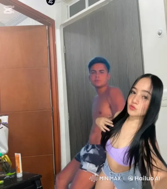 Affectionate Moment Between Young Couple in Cozy Room – AI Generated Video | Hailuo AI