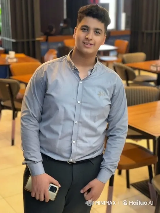 Young Man Smoking in Cozy Café – AI Generated Video | Hailuo AI