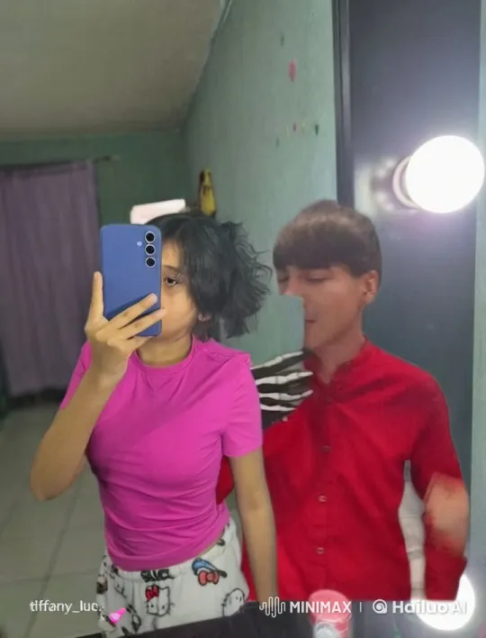 Affectionate Selfie: Girl and Boy in Cozy Room – AI Generated Video | Hailuo AI