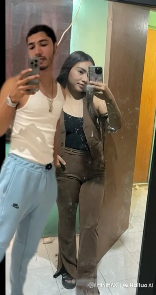 Young Couple Shares Tender Moment in Mirror Reflection – AI Generated Video | Hailuo AI
