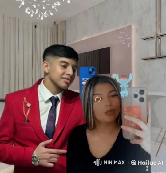 Couple's Elegant Selfie and Romantic Kiss in Modern Setting – AI Generated Video | Hailuo AI