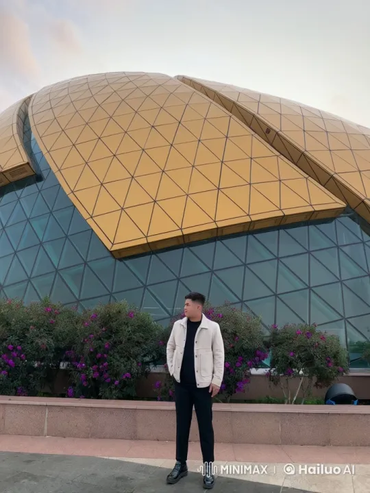 Man Reflects Amidst Moving Clouds and Geometric Structure – AI Generated Video | Hailuo AI