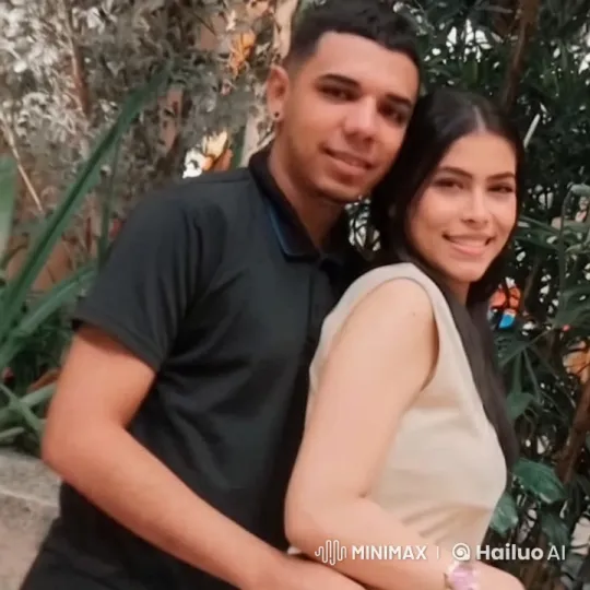 Intimate Couple Shares Gentle Kiss in Verdant Indoor Setting – AI Generated Video | Hailuo AI