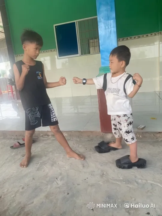Boys Playfully Spar in Outdoor Setting – AI Generated Video | Hailuo AI
