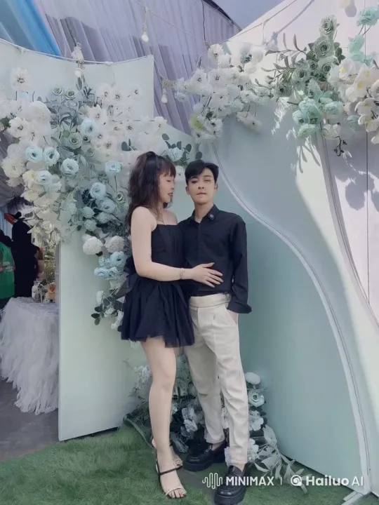 Couple Performs Graceful Kungfu Against Floral Backdrop – AI Generated Video | Hailuo AI
