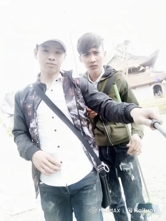 Two Friends Engage in Playful Sparring for a Selfie Video – AI Generated Video | Hailuo AI