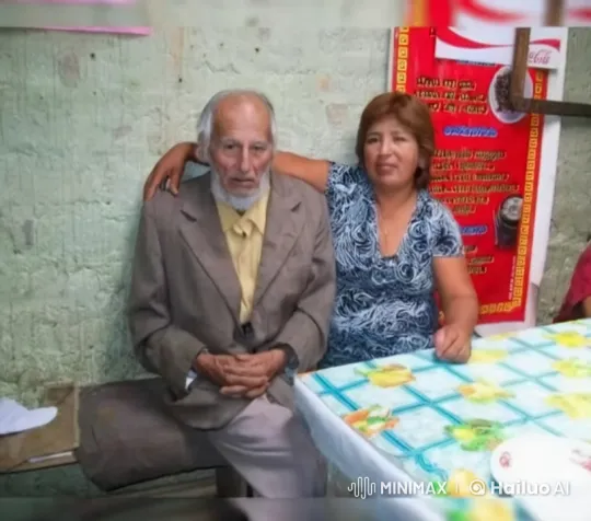 Elderly Couple Sharing Affection at Cozy Table – AI Generated Video | Hailuo AI