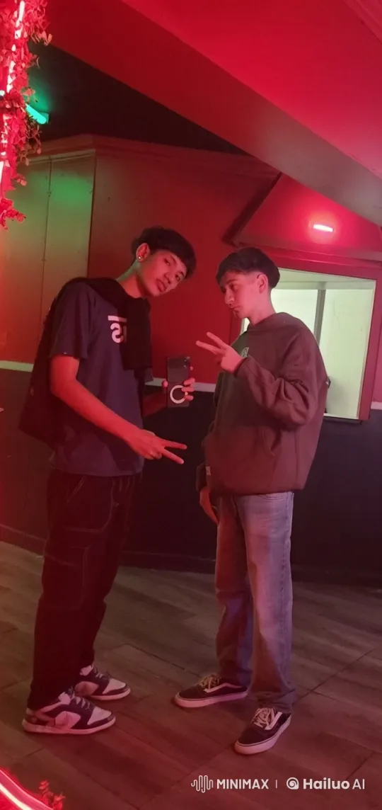 Two Men Share Tender Moment in Urban Setting – AI Generated Video | Hailuo AI