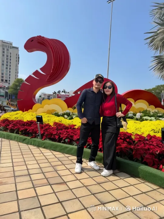 Couple Performing Kungfu in Flower Garden with Dragon Sculpture – AI Generated Video | Hailuo AI