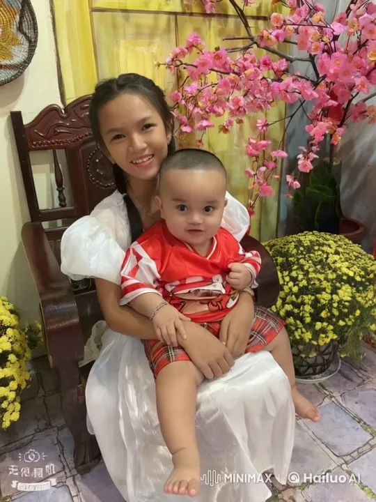 Child Practicing Kung Fu with Young Person in Floral Room – AI Generated Video | Hailuo AI