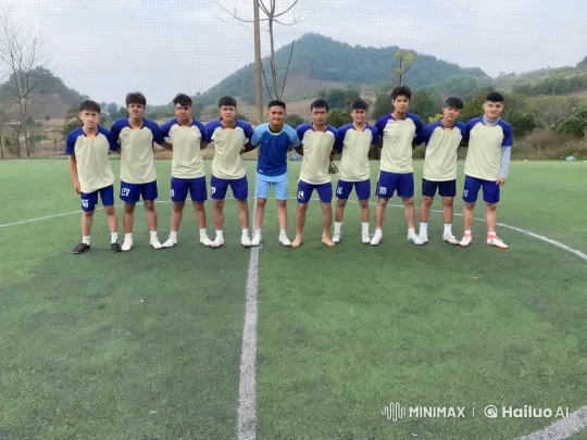 Youth Football Team Showcases Unity on Green Field – AI Generated Video | Hailuo AI