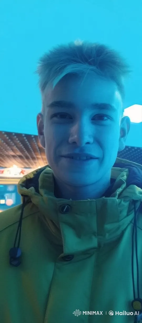 Dynamic Portrait of Man with Vivid Expression in Cyan Setting – AI Generated Video | Hailuo AI