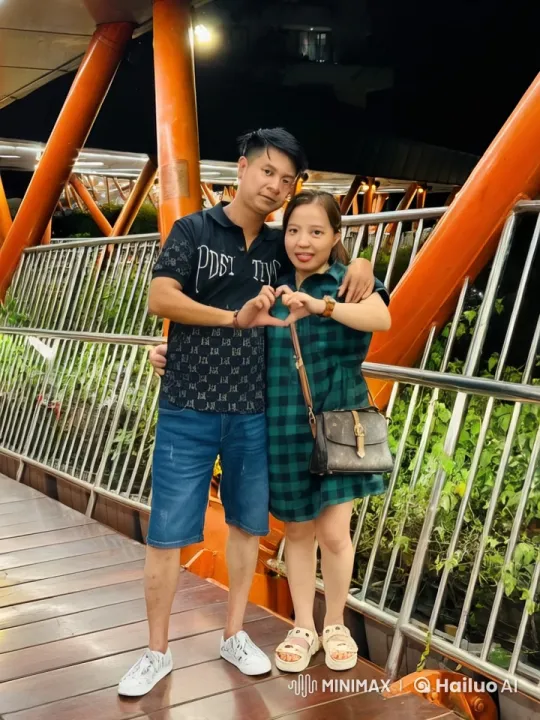 Nighttime Kung Fu Display on Wooden Bridge – AI Generated Video | Hailuo AI