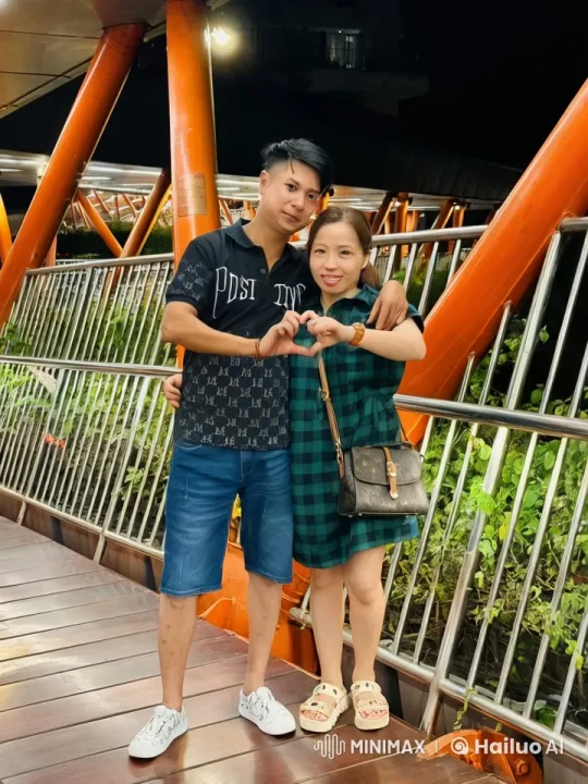 Couple Displays Dynamic Kung Fu on Pedestrian Bridge – AI Generated Video | Hailuo AI
