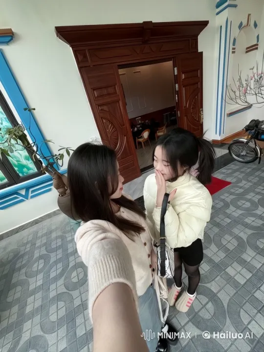 Girls Taking Selfie in Stylish Indoor Setting – AI Generated Video | Hailuo AI